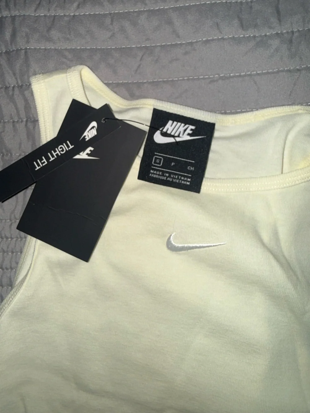 Nike women’s butter yellow Tank Top